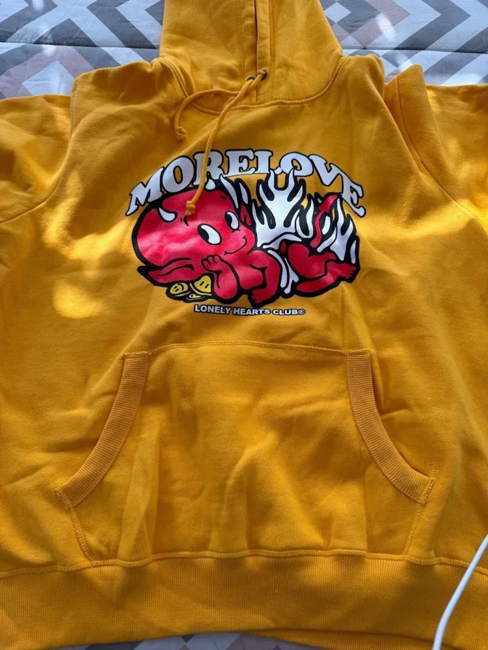 Lonely Hearts MORE LOVE Yellow Graphic Hoodie with Red Devil Print